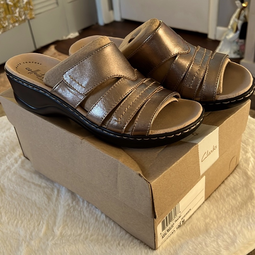 Clark sandals, size 10 metallic color.